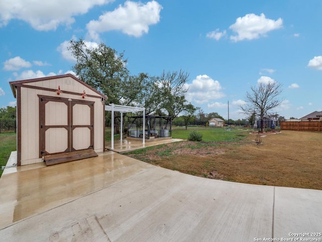 exterior space with a pergola and a storage shed