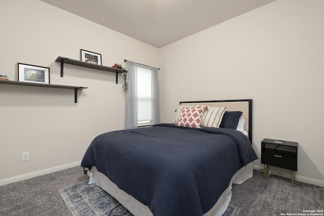 carpeted bedroom featuring lofted ceiling