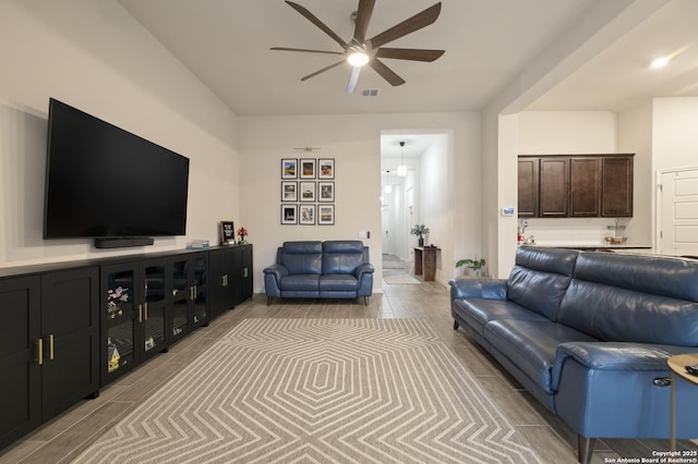 living room featuring ceiling fan