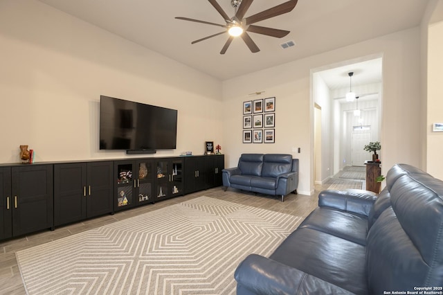 living room featuring ceiling fan