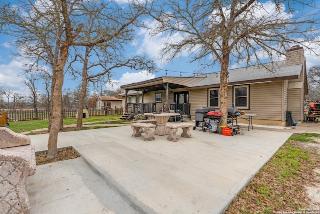 back of house with a patio area