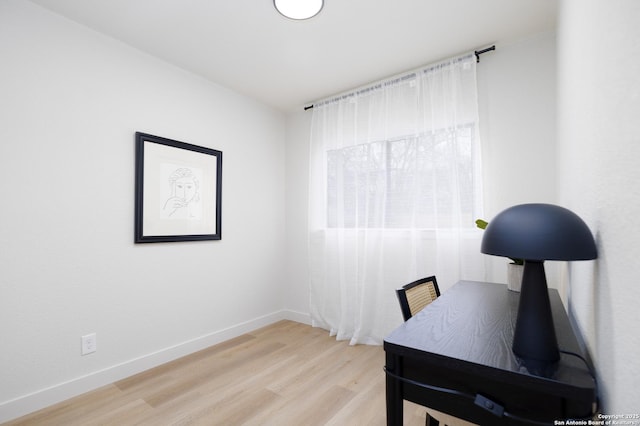 home office featuring light hardwood / wood-style floors