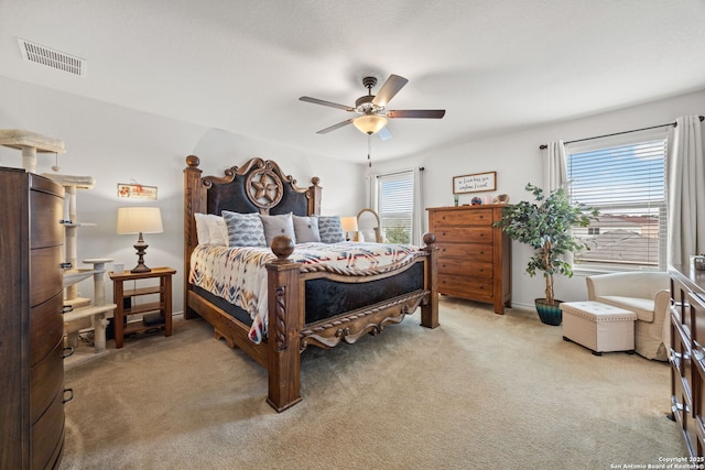 carpeted bedroom with ceiling fan