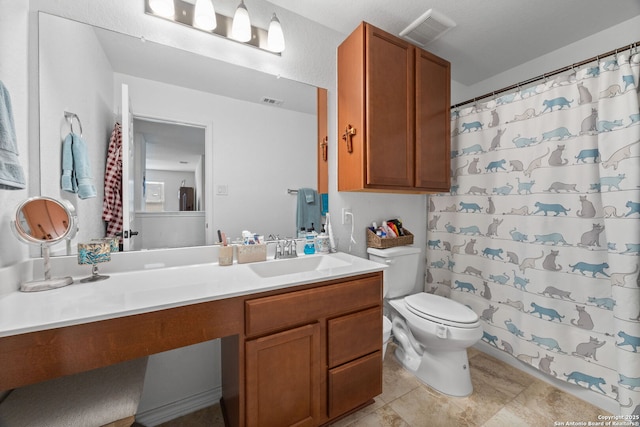 bathroom with tile patterned floors, vanity, toilet, and a shower with shower curtain