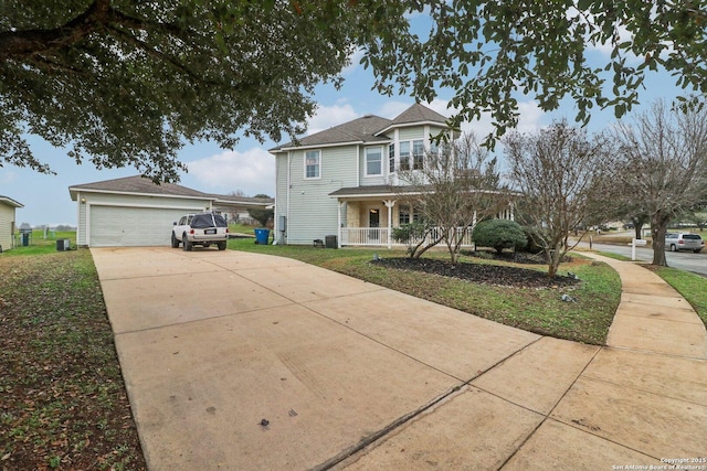 view of front of house featuring a garage and a porch