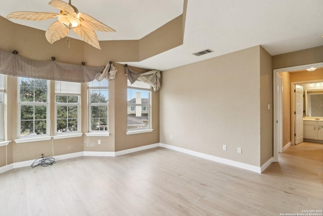 unfurnished room with ceiling fan and light hardwood / wood-style flooring