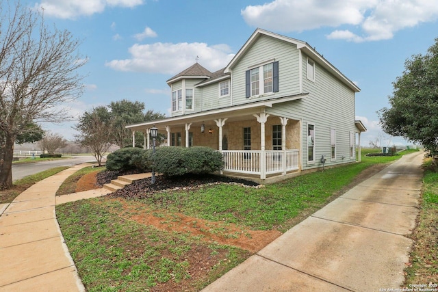 view of front of home featuring covered porch