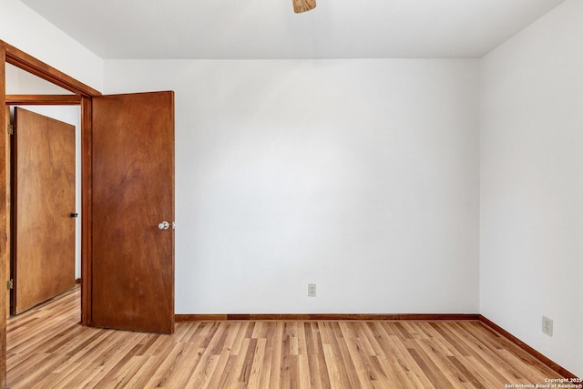 spare room with light hardwood / wood-style flooring