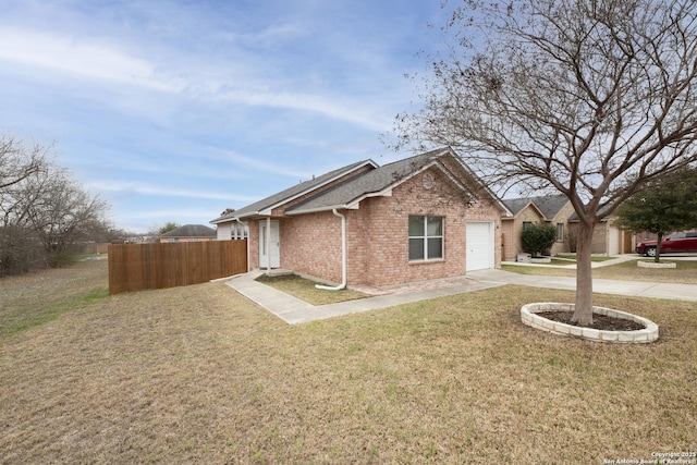 view of home's exterior with a garage and a yard