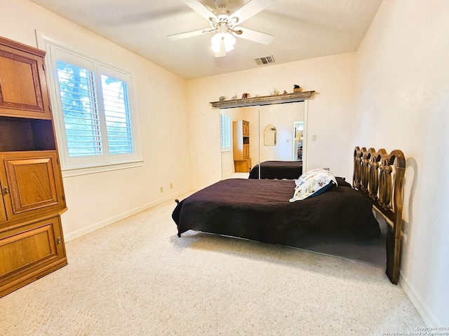 bedroom featuring visible vents, ceiling fan, and baseboards