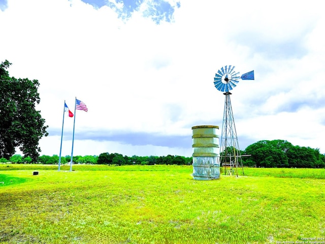 surrounding community featuring a lawn