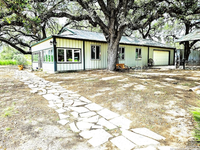 view of front of home featuring driveway and an attached garage