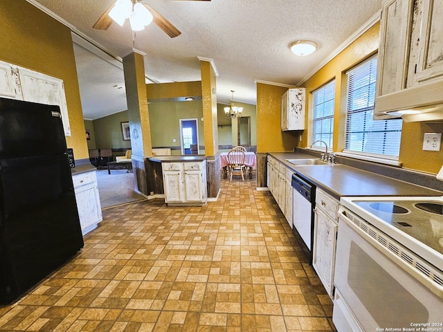 kitchen featuring white electric stove, a peninsula, a sink, freestanding refrigerator, and dark countertops