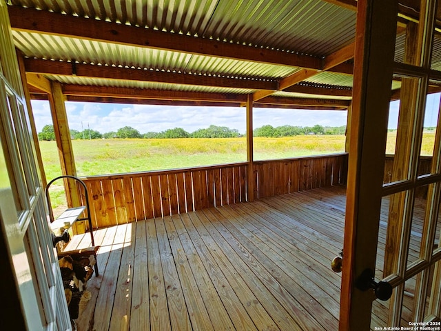 wooden terrace with a rural view