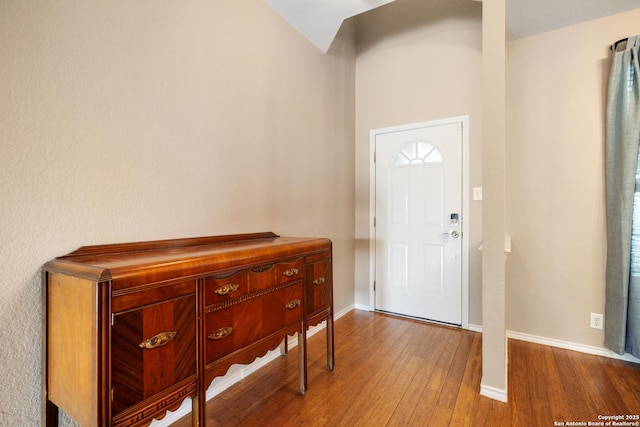 foyer entrance with hardwood / wood-style floors