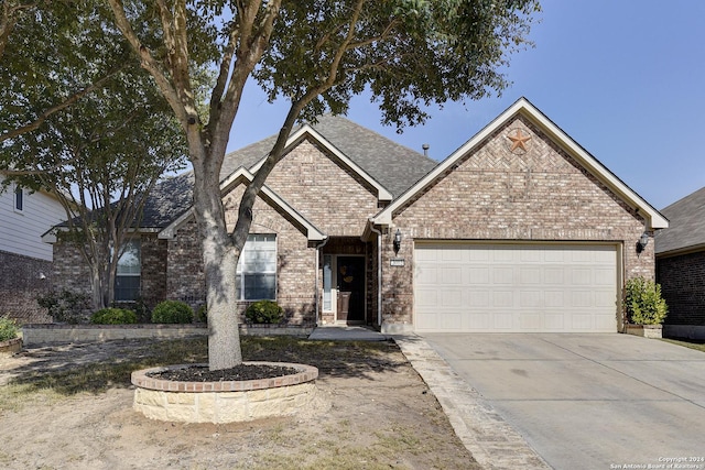 view of front of property featuring a garage