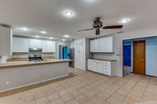 kitchen with white cabinetry, sink, ceiling fan, kitchen peninsula, and stainless steel appliances