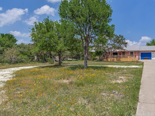 view of yard featuring a garage