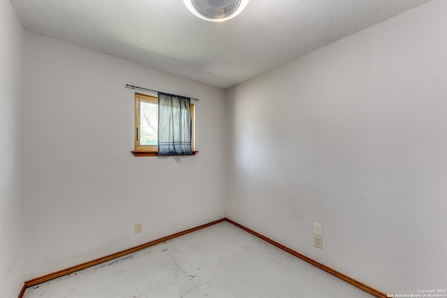 spare room featuring concrete floors