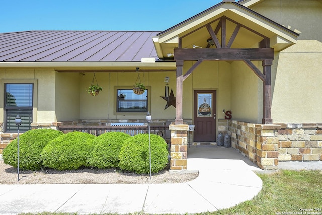 property entrance with a porch