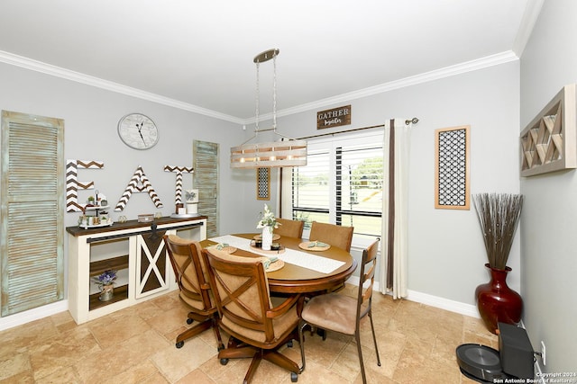 dining area featuring ornamental molding