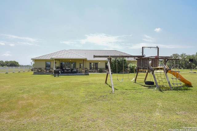 view of play area featuring a yard