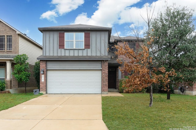 view of front of property with a garage and a front yard