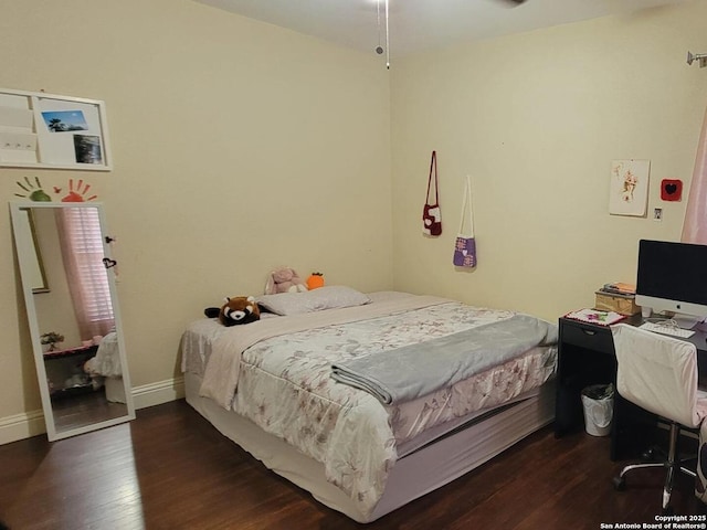 bedroom featuring dark hardwood / wood-style floors