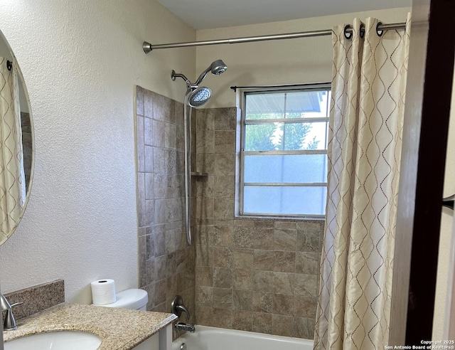 full bathroom featuring shower / bathtub combination with curtain, vanity, and toilet