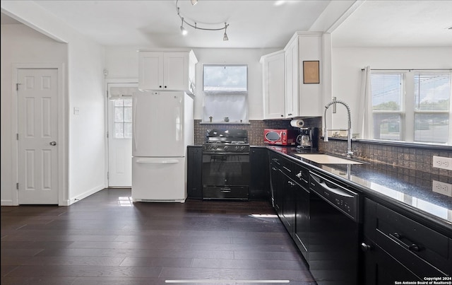 kitchen with sink, white cabinetry, dark hardwood / wood-style floors, decorative backsplash, and black appliances