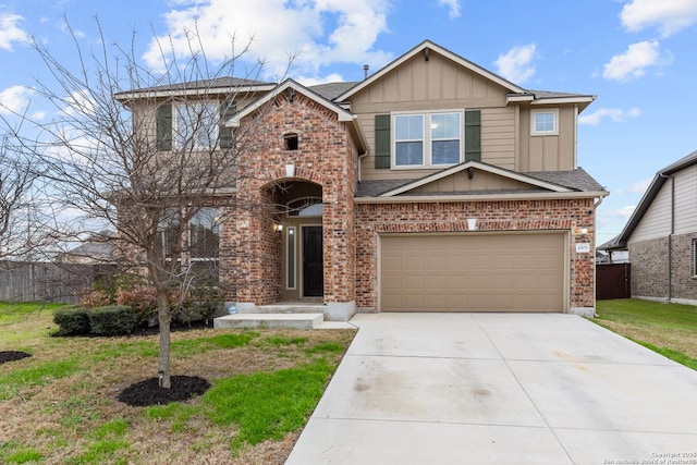 view of front of home with a garage and a front yard