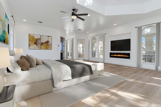 bedroom featuring ceiling fan and light wood-type flooring