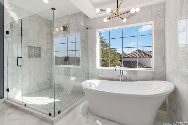 bathroom with shower with separate bathtub