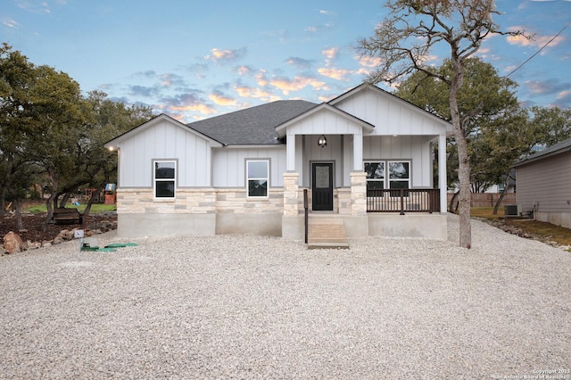 view of front of home featuring central AC and covered porch