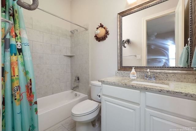 full bathroom with shower / tub combo with curtain, vanity, tile patterned flooring, and toilet