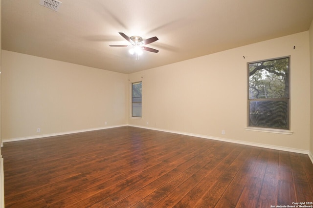 13906 Tahoe Vis, San Antonio, TX 78253 - empty room with dark wood-style flooring, baseboards, ceiling fan, and visible vents