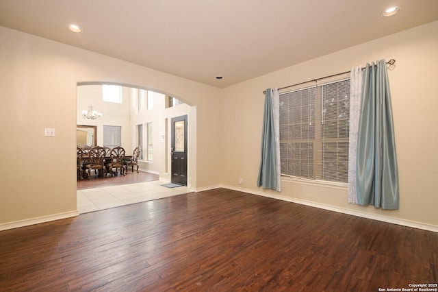 13906 Tahoe Vis, San Antonio, TX 78253 - unfurnished room featuring arched walkways, wood finished floors, a chandelier, and recessed lighting
