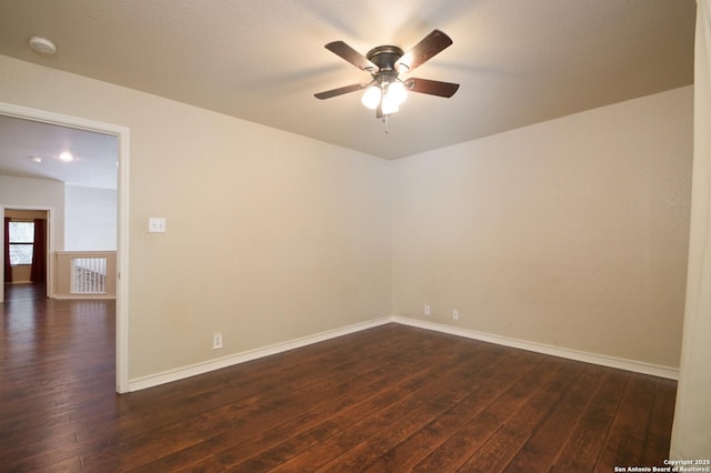 13906 Tahoe Vis, San Antonio, TX 78253 - unfurnished room with a ceiling fan, dark wood-style floors, and baseboards