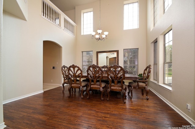 13906 Tahoe Vis, San Antonio, TX 78253 - dining area with arched walkways, a wealth of natural light, and hardwood / wood-style floors
