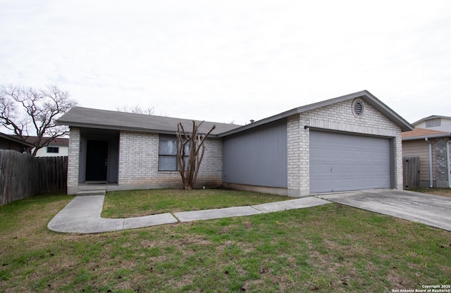 ranch-style home with a garage and a front lawn