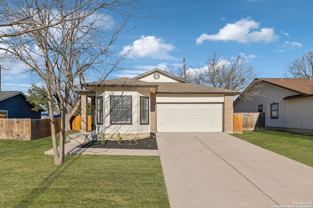 view of front of house with a garage and a front lawn