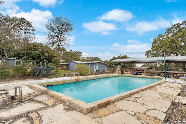 view of swimming pool featuring a gazebo and a patio