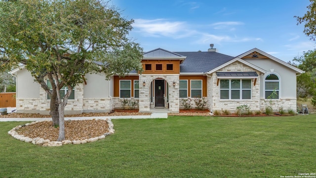 view of front of property with a front lawn