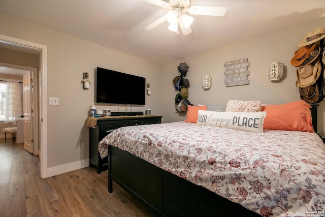 bedroom featuring wood-type flooring and ceiling fan