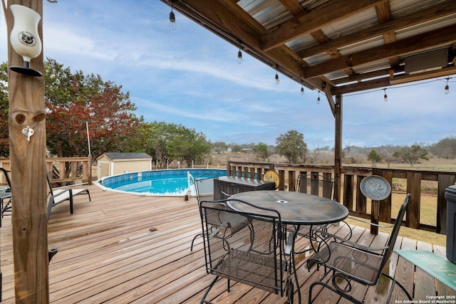 wooden deck with a shed