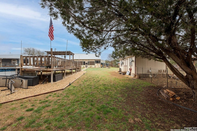 view of yard featuring a swimming pool side deck