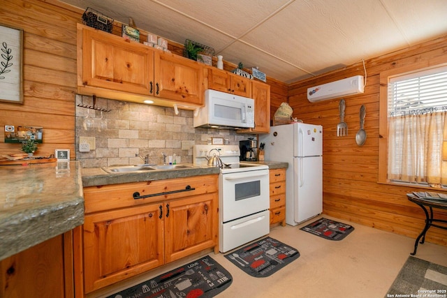 kitchen with sink, wood walls, an AC wall unit, white appliances, and decorative backsplash