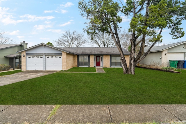 single story home featuring a garage and a front lawn