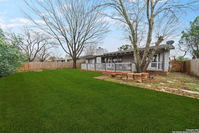 view of yard featuring a deck