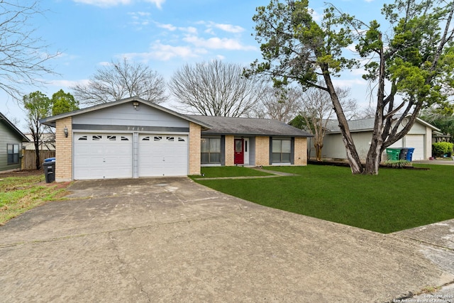 ranch-style house with a garage and a front yard